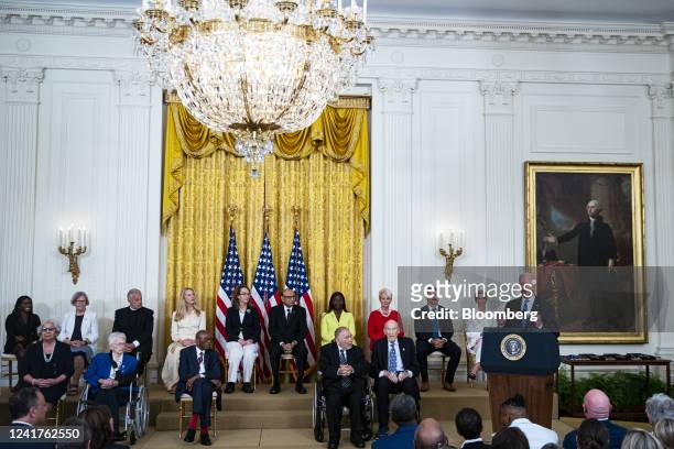 President Joe Biden, right, speaks before presenting the Presidential Medal of Freedom during a ceremony in the East Room of the White House in...