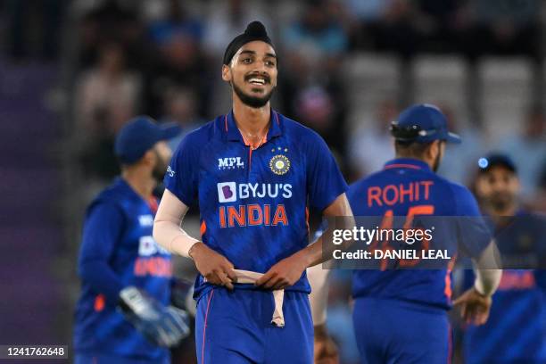 India's Arshdeep Singh smiles during the '1st Vitality IT20' Twenty20 International cricket match between England and India at Ageas Bowl in...