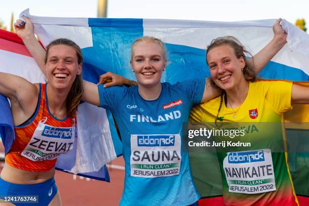 Suze Zeevat of Netherlands, Veera Sauna-Aho of Finland and Orinta Navikaite of Lithuania celebrate after Womens Javelin Throw during day 4 of...