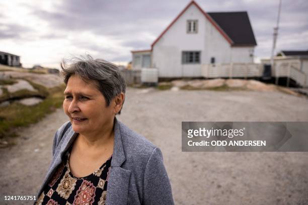 Britta Mortensen speaks with during an AFP interview on June 27, 2022 in Ilulissat, Greenland. - From the mid-1960s to the early 1970s 500 young...