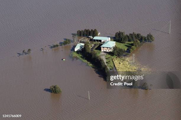 Flooding is shown by helicopter on a tour of the Hunter Region by NSW Premier Dominic Perrottet and Emergency Services and Resilience and Minister...