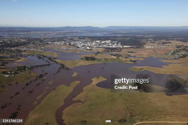 Flooding is shown by helicopter on a tour of the Hunter Region by NSW Premier Dominic Perrottet and Emergency Services and Resilience and Minister...