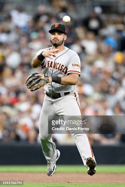 David Villar of the San Francisco Giants throws out Austin Nola of the San Diego Padres during the third inning of a baseball game July 7, 2022 at...