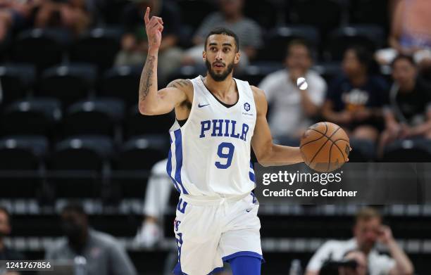 Trevelin Queen of the Philadelphia 76ers calls in a play as he brings the ball up the court against the Oklahoma City Thunder during the first half...