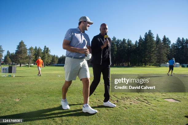 Entertainment Tonight host Kevin Frazier interviews former NFL quarterback and current CBS football analyst Tony Romo before the second practice...