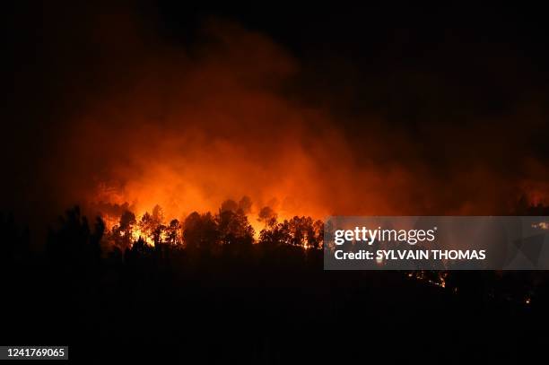 Picture taken in the night between July 7, 2022 and July 8, 2022 shows a wildfire near Besseges, southern France. The fire has destroyed 630 hectares...