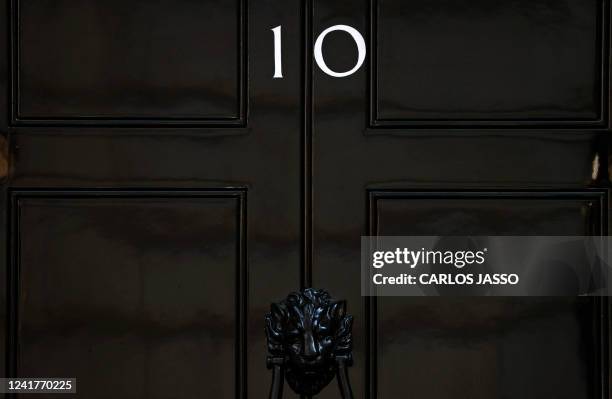 The door of 10 Downing Street, the official residence of Britain's Prime Minister, is pictured in central London on July 8, 2022. UK Prime Minister...