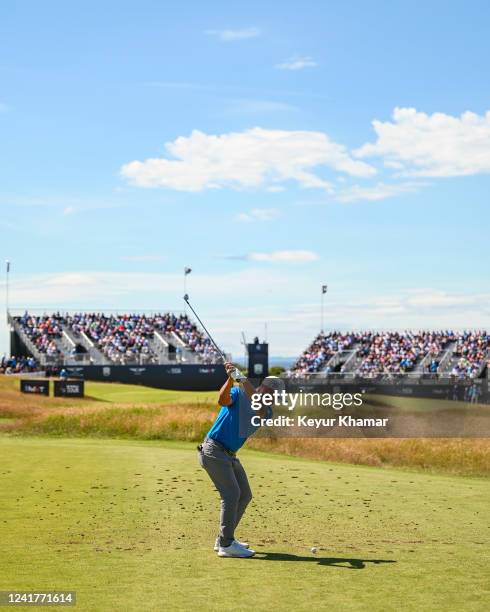 Xander Schauffele at the top of his swing as he plays his shot from the sixth hole tee during the first round of the Genesis Scottish Open at The...