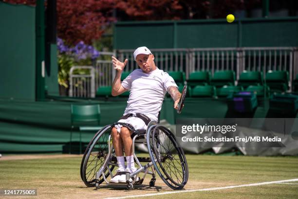 Andy Lapthorne of Great Britain plays alongside of David Wagner of the United States against Donald Ramphadi of South Africa and Koji Sugeno of Japan...