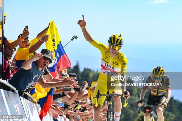 Slovenian Tadej Pogacar of UAE Team Emirates celebrates after winning stage seven of the Tour de France cycling race, a 176 km race from Tomblaine to...