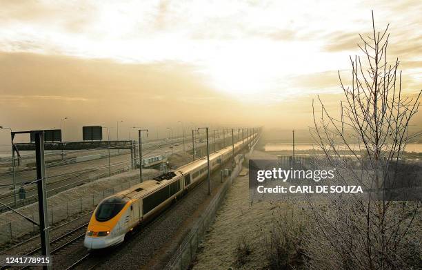 Eurostar train travels through the Kent countryside in south-east England, on its way to London, on December 12, 2008. The Times of London newspaper...
