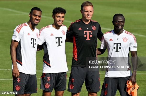 Bayern Munich's new Dutch midfielder Ryan Gravenberch, Moroccan new defender Noussair Mazraoui, Bayern Munich's German head coach Julian Nagelsmann...
