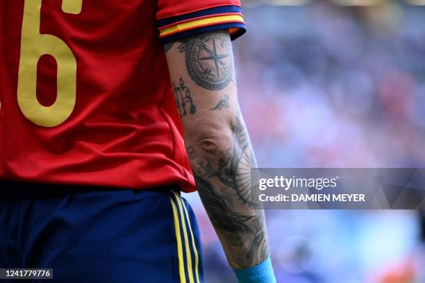 Spain's defender Maria Leon displays her tattoo during the UEFA Women's Euro 2022 Group B football match between Spain and Finland at Stadium MK in...