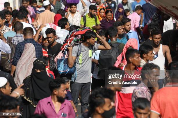 People board crowded ferries as they travel back home ahead of Eid al-Adha, the feast of the sacrifice in Dhaka, Bangladesh on July 8, 2022. Millions...