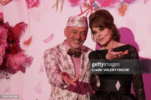 French designer Christian Louboutin and French actress Fanny Ardant pose at a photocall during the 'Bal de la Rose' , in Monaco, on July 8, 2022. -...