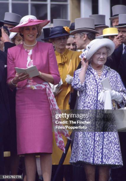 Princess Diana and the Queen Mother attending the Epsom Derby at Epsom racecourse on 3rd June, 1987 in Epsom, England.