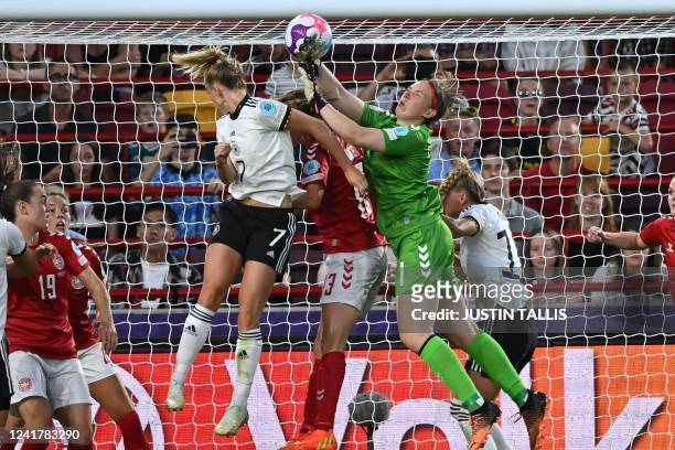 Germany's midfielder Lea Schuller heads home their second goal during the UEFA Women's Euro 2022 Group B football match between Germany and Denmark...