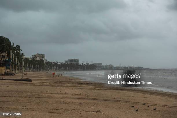Deserted and empty Juhu Beach during high tide after the weather department issued a Red Alert for the city and its adjoining areas on July 8, 2022...