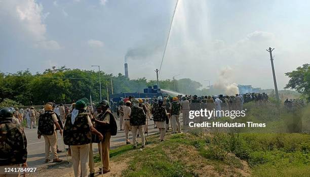 Clash broke out between farmers and police personnel at Khedar power plant on July 8, 2022 in Hisar, India. A farmer died and three policemen were...