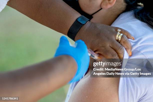 Pasadena , CA People receive booster shots during a COVID vaccination clinic at Villa Parke in Pasadena Friday, July 8, 2022.