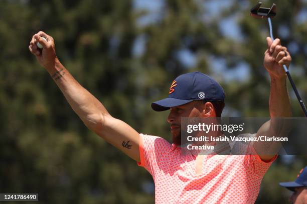 Basketball player Stephen Curry hushes the crowd on the 17th hole during Round One of the 2022 American Century Championship at Edgewood Tahoe Golf...