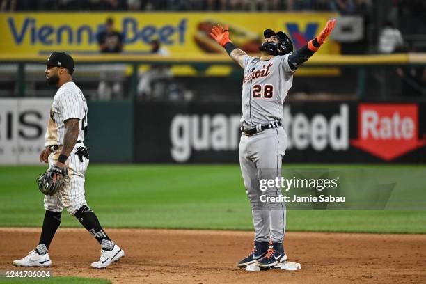 Javier Báez of the Detroit Tigers takes in the reaction of the crowd after hitting a two-run double in the seventh inning against the Chicago White...