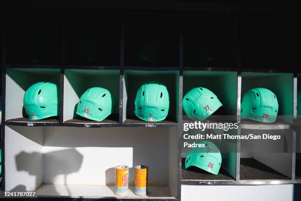 The San Diego Padres batting City Connect jersey helmets sit in their cubbies before the game against the San Francisco Giants on July 8, 2022 at...