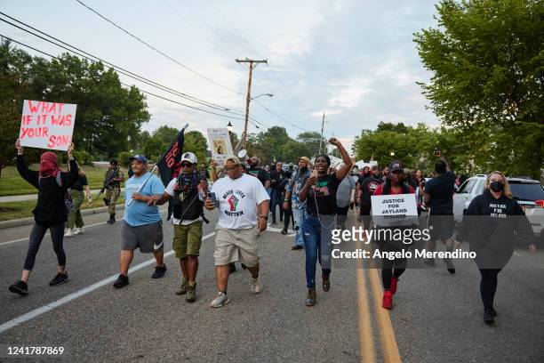 Demonstrators march down E. Wilbeth St. After holding a vigil in honor of Jayland Walker on July 8, 2022 in Akron, Ohio. Walker was shot by members...