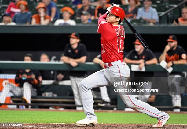 Los Angeles Angels designated hitter Shohei Ohtani hits a solo home run in the ninth inning during the Los Angeles Angels game versus the Baltimore...