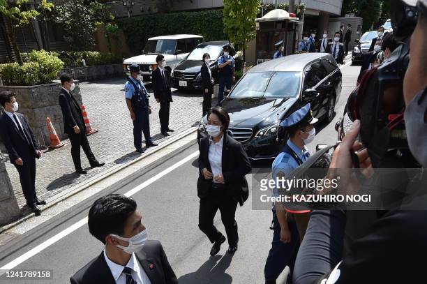 Hearse transporting the body of former Japanese prime minister Shinzo Abe arrives at his residence in Tokyo on July 9, 2022. - Japan's former prime...