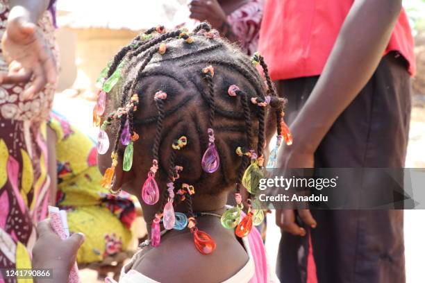 Children, with their colorful braids, are seen in Segou, Mali on July 08, 2022. In the country, girls greet Eid-al-Adha with different hairstyles...