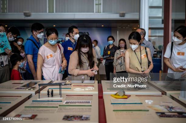 Visitors Looking at exhibition items inside the ICAC Headquarters Building on July 9, 2022 in Hong Kong, China. The Independent Commission Against...