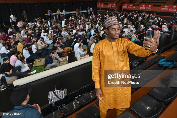 Muslims offer Eid al-Adha prayers inside a sports center in Krakow, Muslims around the world celebrate Eid al-Adha, or the Feast of the Sacrifice,...