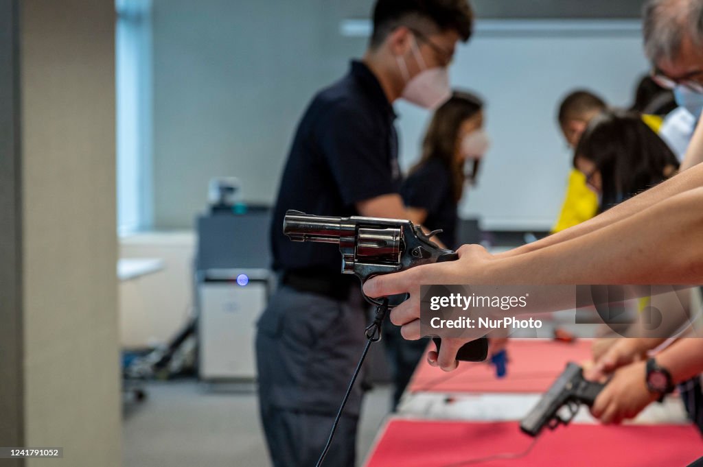 Icac Building A Man holding a pistol inside the ICAC Headquarters Building on July ...