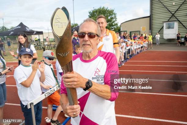 Mick Ennis takes part in The Queen's Baton Relay as it visits Lynnsport as part of the Birmingham 2022 Queens Baton Relay on July 9, 2022 in King's...