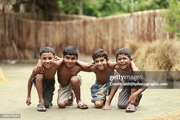 portrait of village boys - bangladeshi child stock pictures, royalty-free photos & images