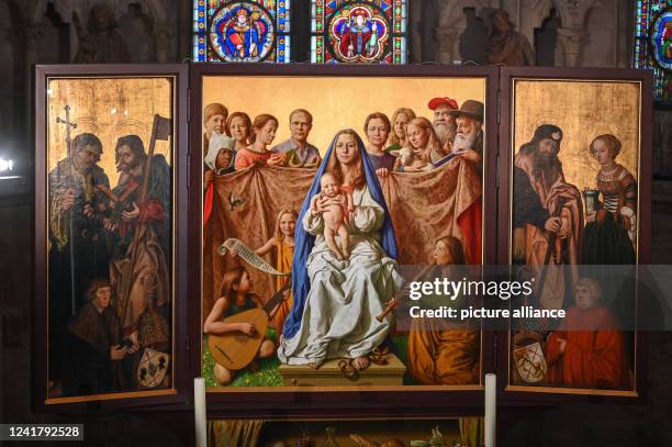 July 2022, Saxony-Anhalt, Naumburg: The newly created central section of the Marian altar in Naumburg Cathedral by Leipzig artist Michael Triegel....