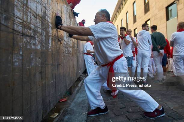 Third running of the bulls at the San Fermin Festival in Pamplona, northern Spain, on July 9, 2022. Revelers from all over the world flock to...