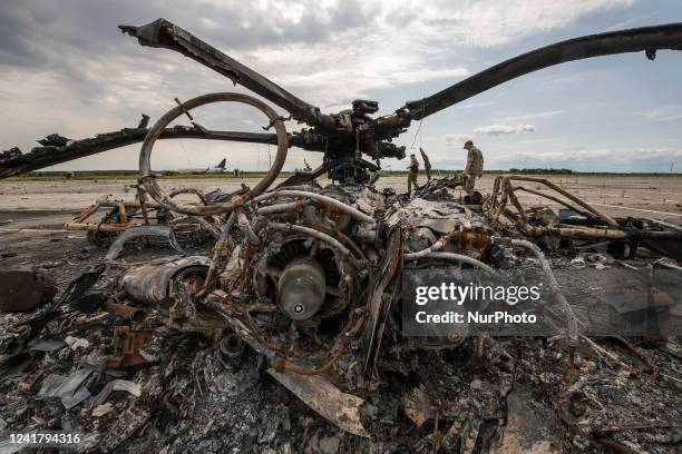 Fragments of the Russian Military Mi-8 Helicopter Destroyed by Ukrainian Servicemen during Russia's invasion of Ukraine at the Gostomel airfield near...