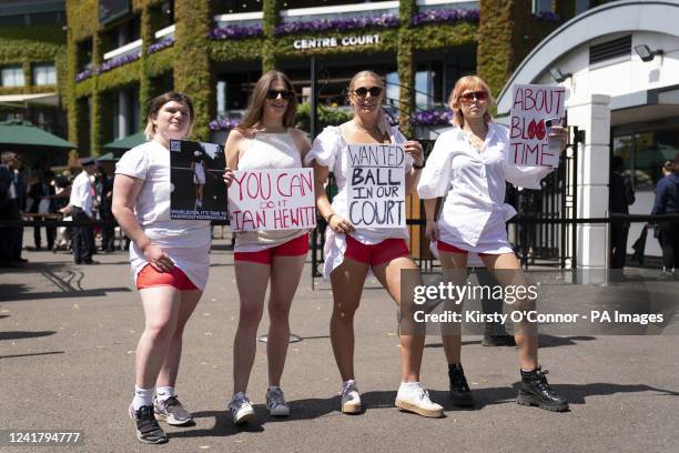 Campaigners from Address The Dress Code outside the main gate at Wimbledon protest over its all white dress code while women are on their period, on...