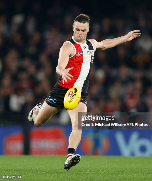 Brad Crouch of the Saints kicks the ball during the 2022 AFL Round 17 match between the St Kilda Saints and the Fremantle Dockers at Marvel Stadium...