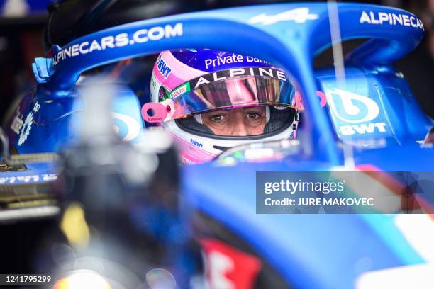 Alpine's Spanish driver Fernando Alonso arrives for a pit stop during the second practice session at the Red Bull Ring race track in Spielberg,...