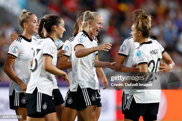 Lea Schüller of Germany celebrates after scoring his team's second goal with team mates during the UEFA Women's Euro England 2022 group B match...