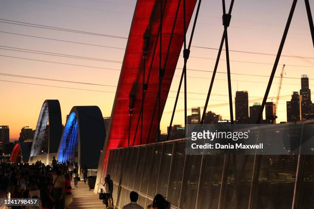 Los Angeles, CA Red, white and blue lights are illuminated during the grand opening arch lighting ceremony for the 6th Street Bridge on Friday, July...