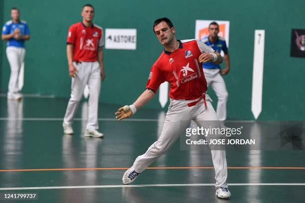 Contestant returns the ball during the Pelota championship of the San Fermin festival in Pamplona, northern Spain on July 9, 2022.