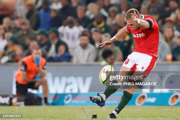 Wales' Gareth Anscombe kicks the ball to convert a point during an international rugby union match between South Africa and Wales at the Toyota...