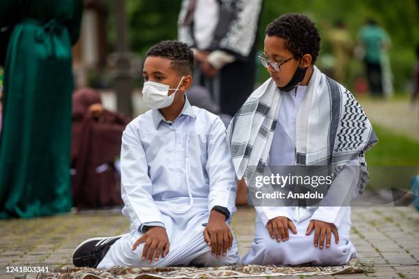 Muslim children perform the Eid Al-Adha prayer at Diyanet Center of America in Washington, United States on July 09, 2022. Eid al-Adha, also called...