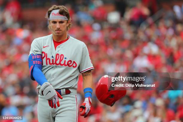 Bryson Stott of the Philadelphia Phillies reacts after hitting into a double play against the St. Louis Cardinals in the second inning at Busch...