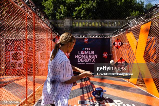 Fans participate in event activities during the FTX MLB Home Run Derby X at Crystal Palace Park on Saturday, July 9, 2022 in London, England.