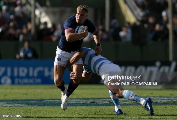 Scotland's Duhan van der Merwe tries to avoid a tackle during the international rugby union test match against Argentina, at the Padre Ernesto...